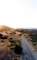 An image of a California highway taken by a drone. The roads crisscross and it looks like a complicated and dangerous place for wildlife to cross.